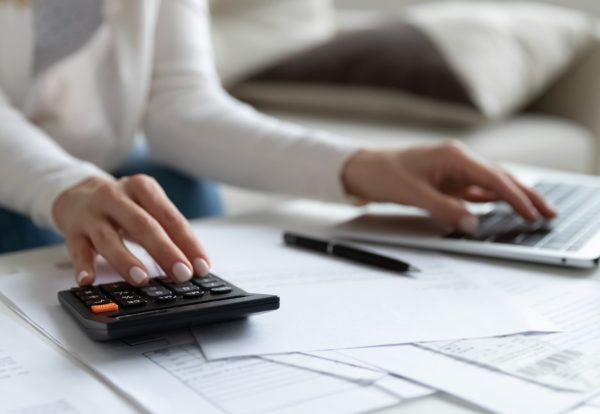 Close,Up,Of,Woman,Busy,Paying,Bills,Online,On,Computer